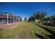 Fenced backyard with screened pool and shed at 921 Great Falls Nw Ter, Port Charlotte, FL 33948