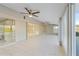 Bright sunroom featuring floor to ceiling glass windows overlooking the waterfront at 130 Arlington Ne Ct, Port Charlotte, FL 33952