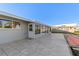 A spacious patio with tile flooring leads to a sunroom at 130 Arlington Ne Ct, Port Charlotte, FL 33952