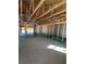 Under construction home interior showing exposed framing and insulation at 13541 Jeronimo Ln, Port Charlotte, FL 33981