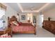 Bright and airy Primary bedroom with king-size bed and ensuite bathroom access at 15600 Aldama Cir, Port Charlotte, FL 33981