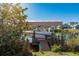 Private boat dock with lift on the canal behind a beautiful home in a sunny waterfront community at 15600 Aldama Cir, Port Charlotte, FL 33981