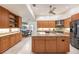 Bright kitchen featuring granite countertops, stainless steel appliances, and an island at 15600 Aldama Cir, Port Charlotte, FL 33981