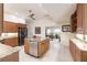 A well-equipped kitchen with granite countertops, stainless steel appliances, and ample cabinet space at 15600 Aldama Cir, Port Charlotte, FL 33981