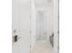 Bright hallway with doors leading to bedrooms at 15976 Shoreline Dr, Punta Gorda, FL 33982