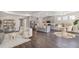 Open-concept living area with a kitchen island and dining area at 16114 Highgate St, Port Charlotte, FL 33953