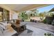 Cozy patio area with seating and access to a private backyard at 17080 Kellog Ave, Port Charlotte, FL 33954