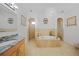 Relaxing bathroom with soaking tub and double vanity at 17080 Kellog Ave, Port Charlotte, FL 33954