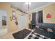 Cozy bedroom featuring a bed, workspace, and ample closet space at 17080 Kellog Ave, Port Charlotte, FL 33954