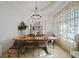 Rustic farmhouse dining room with large wooden table at 17080 Kellog Ave, Port Charlotte, FL 33954