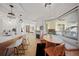 Eat-in kitchen with island seating and view to backyard at 17080 Kellog Ave, Port Charlotte, FL 33954