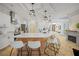 Open concept kitchen with large island and seating for four at 17080 Kellog Ave, Port Charlotte, FL 33954