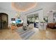 Open living room with comfortable seating and views to backyard at 17080 Kellog Ave, Port Charlotte, FL 33954