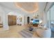 Open living space with high ceilings and wood beams at 17080 Kellog Ave, Port Charlotte, FL 33954