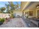 Outdoor patio area with brick pavers and comfortable seating at 17080 Kellog Ave, Port Charlotte, FL 33954