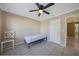 Small bedroom with tile floors and a ceiling fan at 2030 Basin St, Port Charlotte, FL 33952