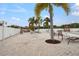 Community pool area with palm trees and gazebo at 25225 Rampart Blvd # 502, Punta Gorda, FL 33983