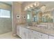 Spa-like bathroom with double sinks and walk-in shower at 3736 Bal Harbor Blvd, Punta Gorda, FL 33950
