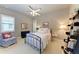 Cozy bedroom with a comfortable bed and built in shelving at 3736 Bal Harbor Blvd, Punta Gorda, FL 33950