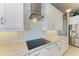 Modern kitchen features stainless steel appliances and granite countertops at 3736 Bal Harbor Blvd, Punta Gorda, FL 33950