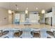 Modern kitchen with white cabinetry, granite countertops, and stainless steel appliances at 3736 Bal Harbor Blvd, Punta Gorda, FL 33950