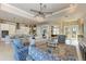 Open concept kitchen with island, stainless steel appliances, and breakfast bar at 3736 Bal Harbor Blvd, Punta Gorda, FL 33950