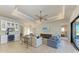Bright and airy living room with built-in bar and access to the backyard at 3736 Bal Harbor Blvd, Punta Gorda, FL 33950