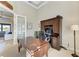 Home office with built-in cabinetry and a large desk at 3736 Bal Harbor Blvd, Punta Gorda, FL 33950