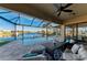 Covered patio with pool and canal views at 3736 Bal Harbor Blvd, Punta Gorda, FL 33950