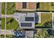 Aerial view showcasing home, yard, and solar panels at 4073 67Th N Ave, Pinellas Park, FL 33781