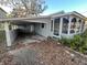 House exterior with carport and screened porch at 4511 Ganyard St, Port Charlotte, FL 33980