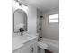 Modern bathroom featuring a sleek vanity, new fixtures, tiled walls, and a shower at 5344 Swaying Palm Dr, Punta Gorda, FL 33982