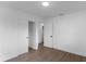 Cozy bedroom with wood-look floors and a closet at 5344 Swaying Palm Dr, Punta Gorda, FL 33982
