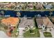 Bird's-eye view of waterfront property with private dock and canal access at 566 Port Bendres Dr, Punta Gorda, FL 33950
