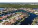 Stunning aerial view of waterfront home in a desirable community at 566 Port Bendres Dr, Punta Gorda, FL 33950