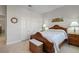 Guest bedroom with wooden bed frame and ample closet space at 566 Port Bendres Dr, Punta Gorda, FL 33950