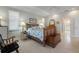 Bright bedroom with a queen-size bed and access to a bathroom at 566 Port Bendres Dr, Punta Gorda, FL 33950