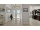 Bright and airy entryway with double doors and office at 566 Port Bendres Dr, Punta Gorda, FL 33950