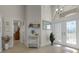 Spacious foyer with decorative accents and access to other rooms at 566 Port Bendres Dr, Punta Gorda, FL 33950