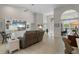 Bright living room features a comfy couch and built-in entertainment center at 566 Port Bendres Dr, Punta Gorda, FL 33950