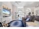 Relaxing living room with comfortable seating and built-in entertainment center at 566 Port Bendres Dr, Punta Gorda, FL 33950