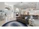 Open and airy living space with a view into kitchen and entry at 566 Port Bendres Dr, Punta Gorda, FL 33950