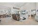 Bright and airy living room with large windows and comfortable seating at 566 Port Bendres Dr, Punta Gorda, FL 33950