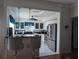 Kitchen boasting a breakfast bar and stainless steel appliances at 5800 Sabal Trace Dr # 507, North Port, FL 34287