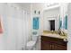 Bathroom with shower/tub combo, toilet and single vanity at 7177 W Lenox Cir, Punta Gorda, FL 33950