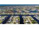 Aerial view showcasing a waterfront home in a peaceful community at 740 Kingfish Ct, Punta Gorda, FL 33950
