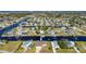 Aerial view of waterfront home with private dock and canal access at 740 Kingfish Ct, Punta Gorda, FL 33950