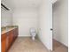 Bathroom with granite vanity, tiled floor and toilet at 740 Kingfish Ct, Punta Gorda, FL 33950