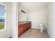 Bathroom with granite vanity, tiled floor and toilet at 740 Kingfish Ct, Punta Gorda, FL 33950