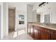 Bathroom with walk-in shower and granite vanity at 740 Kingfish Ct, Punta Gorda, FL 33950